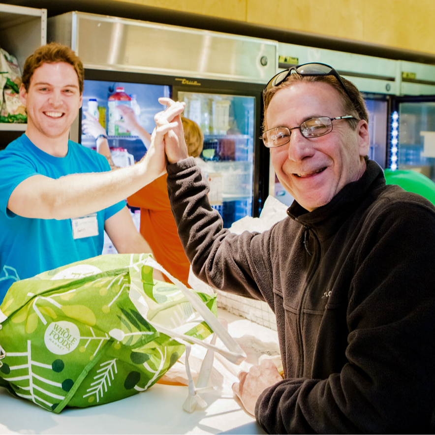 Lakeview Pantry employee with patron