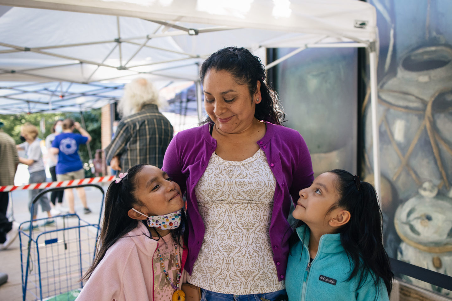 Maria Medina and her two daughters, Rachel and Sarai, enjoyed each other's company at Sheridan Market. 