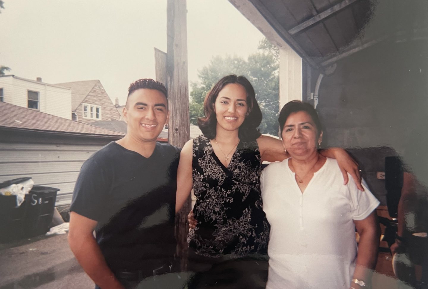 The author's family from left to right: brother Gilberto, sister Eliut and mother Elvira Limas.