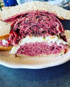 Deli King of Clark's triple-decker sandwich, "sloppy style."